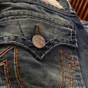 True Religion Distressed Blue Jeans with Contrast Stitching